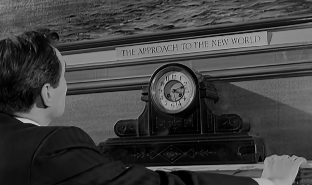 Still from the film A Night to Remember, showing Titanic architect Thomas Andrews looking at the clock in the Titanic's final minutes.